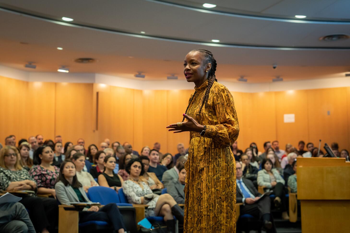 Modupe Akinola delivers a lecture to a crowded hall