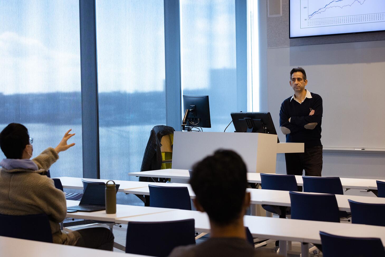 Student asking the professor a question in class