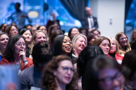 A student attends an industry lecture and networking event